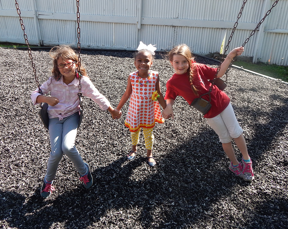 Girls on a swing